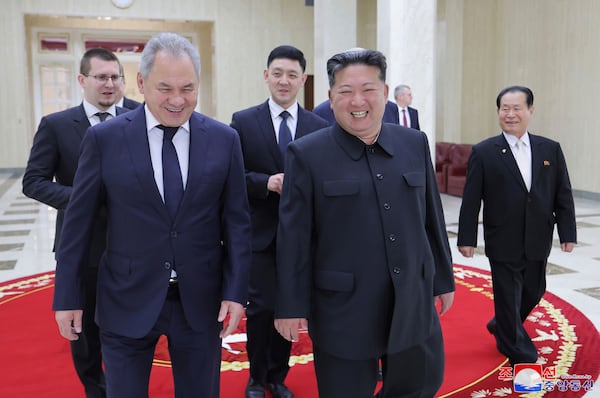 In this this photo provided by the North Korean government, Russia's Security Council Secretary, Sergey Shoigu, left, and North Korean leader Kim Jong Un walk togethers during their meeting in Pyongyang, North Korea Friday, March 21, 2025. Independent journalists were not given access to cover the event depicted in this image distributed by the North Korean government. The content of this image is as provided and cannot be independently verified. Korean language watermark on image as provided by source reads: "KCNA" which is the abbreviation for Korean Central News Agency. (Korean Central News Agency/Korea News Service via AP)