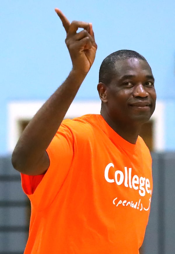 May 20, 2017, Atlanta: Dikembe Mutombo wags his finger as he takes the court for the Breakthrough Atlanta Celebrity Basketball Game at the Lovett School on Saturday, May 20, 2017, in Atlanta.     Curtis Compton/ccompton@ajc.com