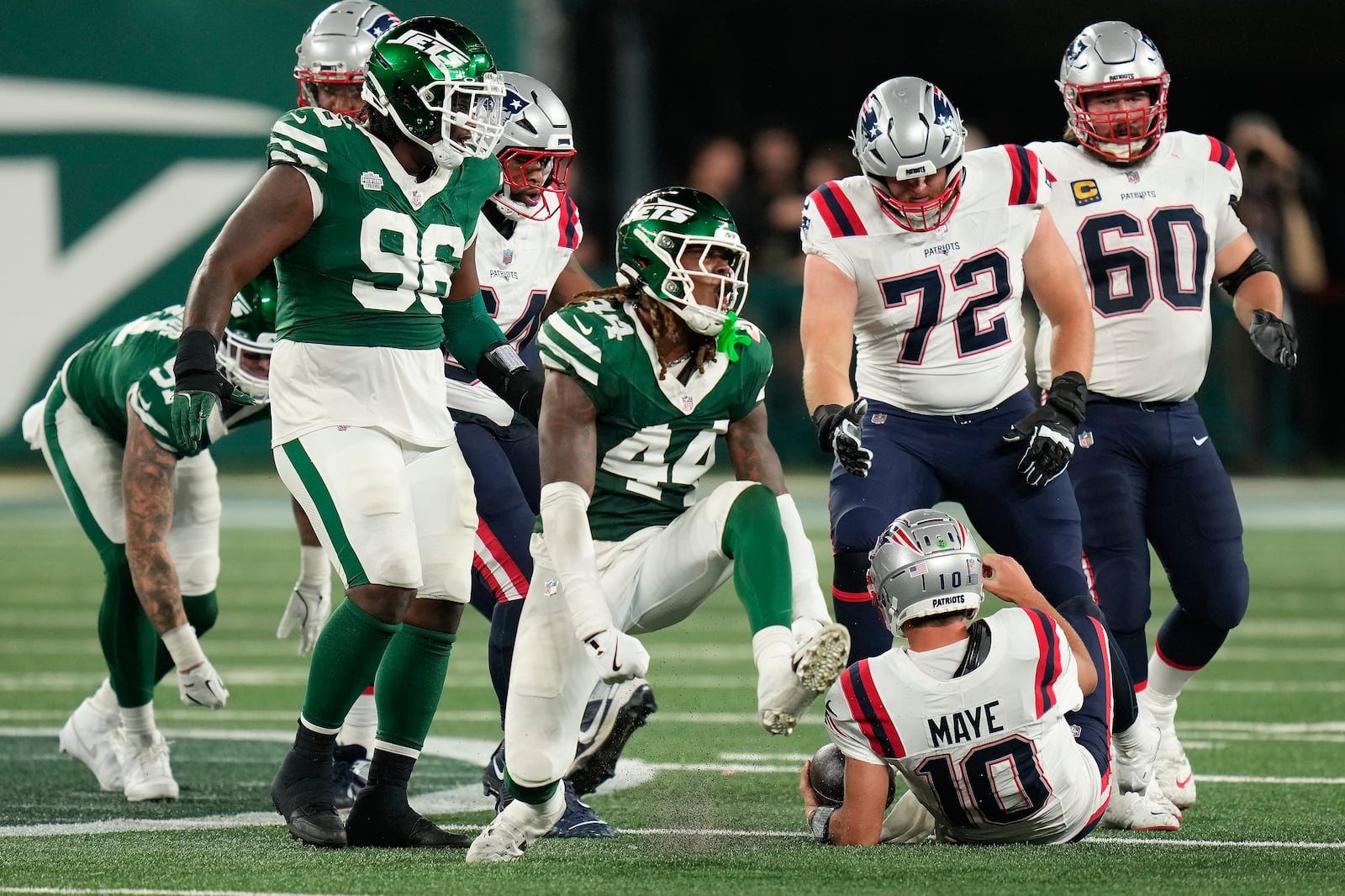 New York Jets linebacker Jamien Sherwood (44) reacts after sacking New England Patriots quarterback Drake Maye (10) during the fourth quarter of an NFL football game, Thursday, Sept. 19, 2024, in East Rutherford, N.J. (AP Photo/Seth Wenig)