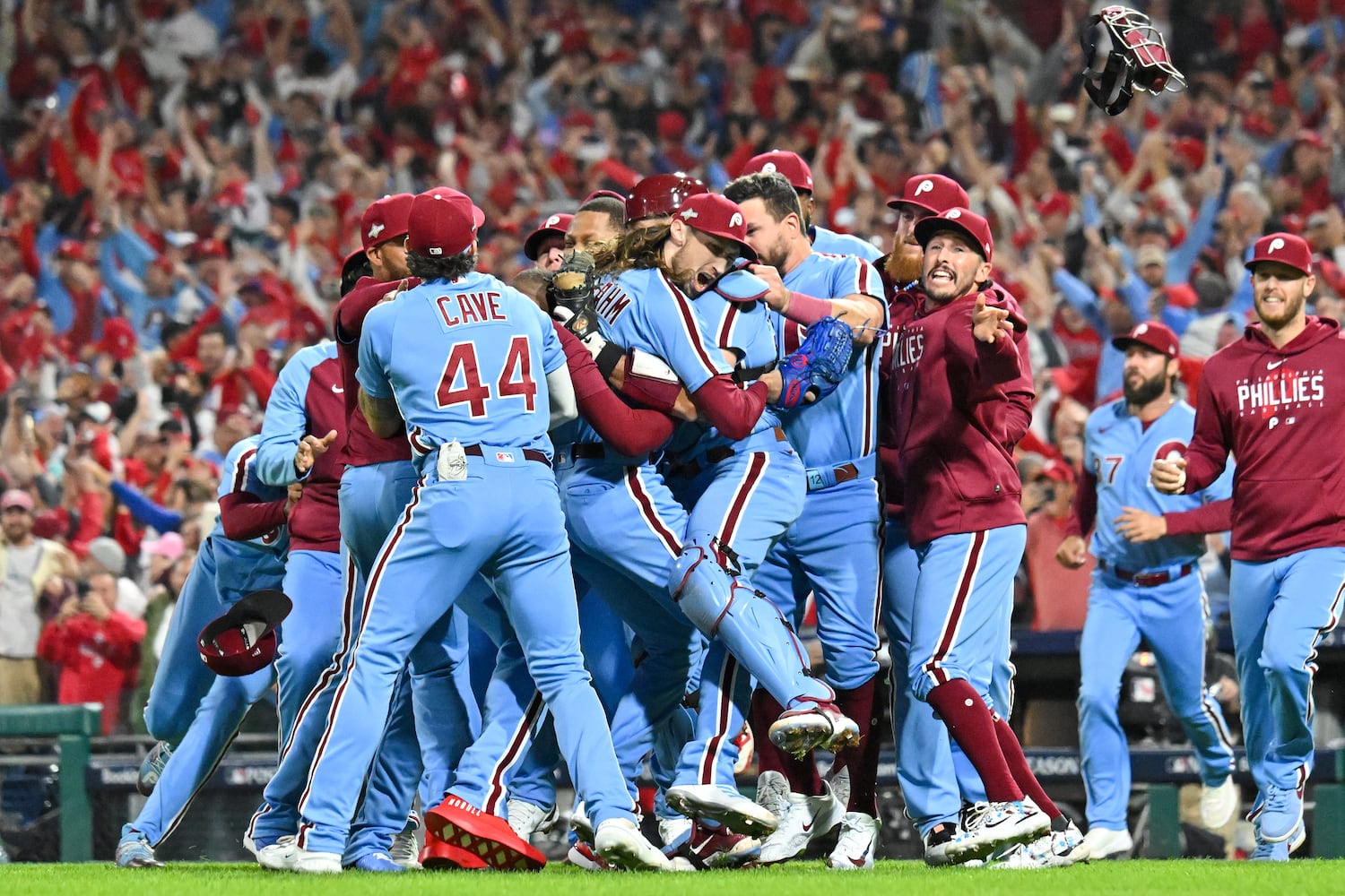 Philadelphia Phillies relief pitcher Matt Strahm, center, celebrates with teammates after a 3-1 NLDS Game 4 win over the Atlanta Braves at Citizens Bank Park in Philadelphia on Thursday, Oct. 12, 2023.   (Hyosub Shin / Hyosub.Shin@ajc.com)