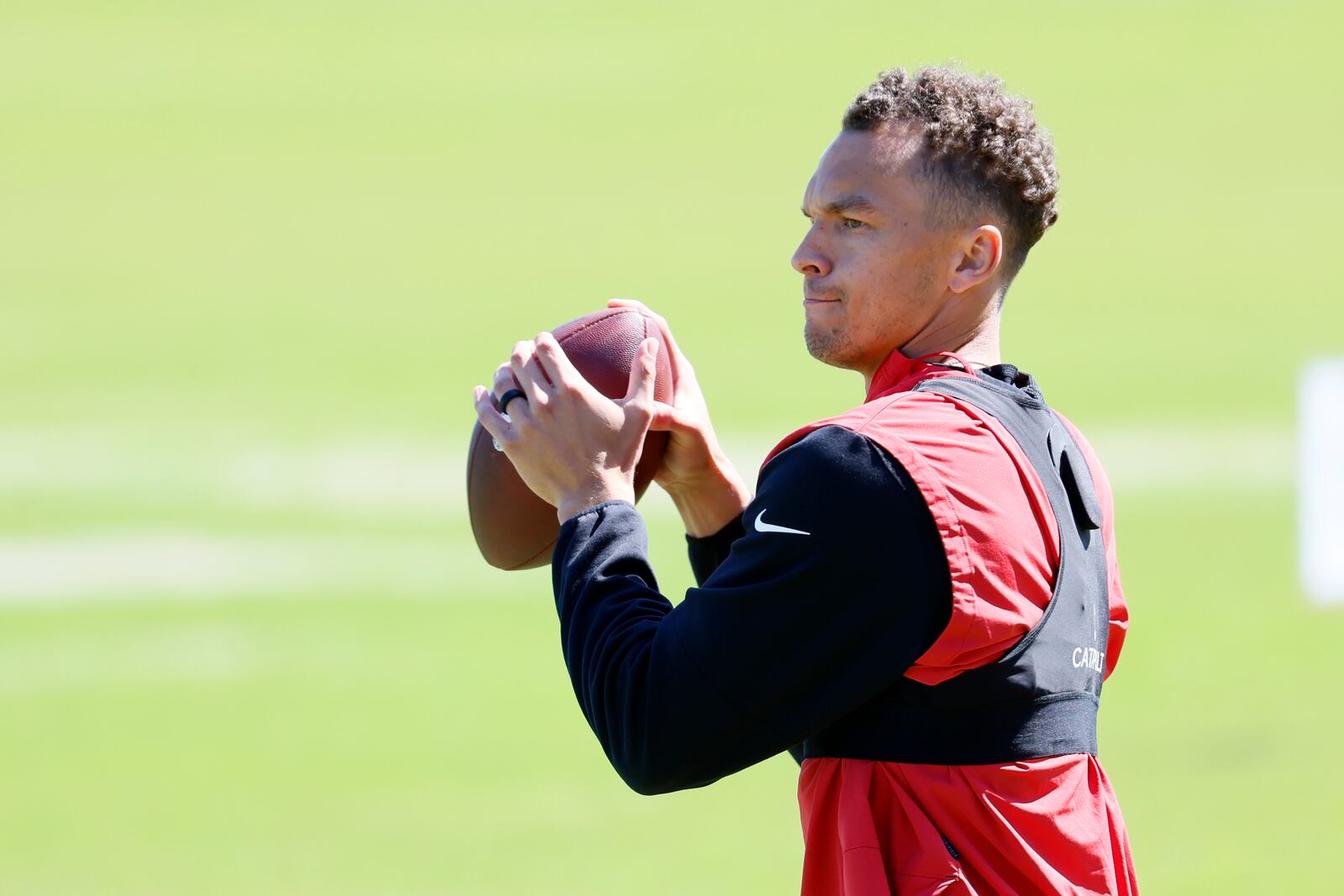 Falcons quarterback Desmond Ridder gets in some throws Tuesday as he nparticipates in the team's offseason conditioning program in Flowery Branch.