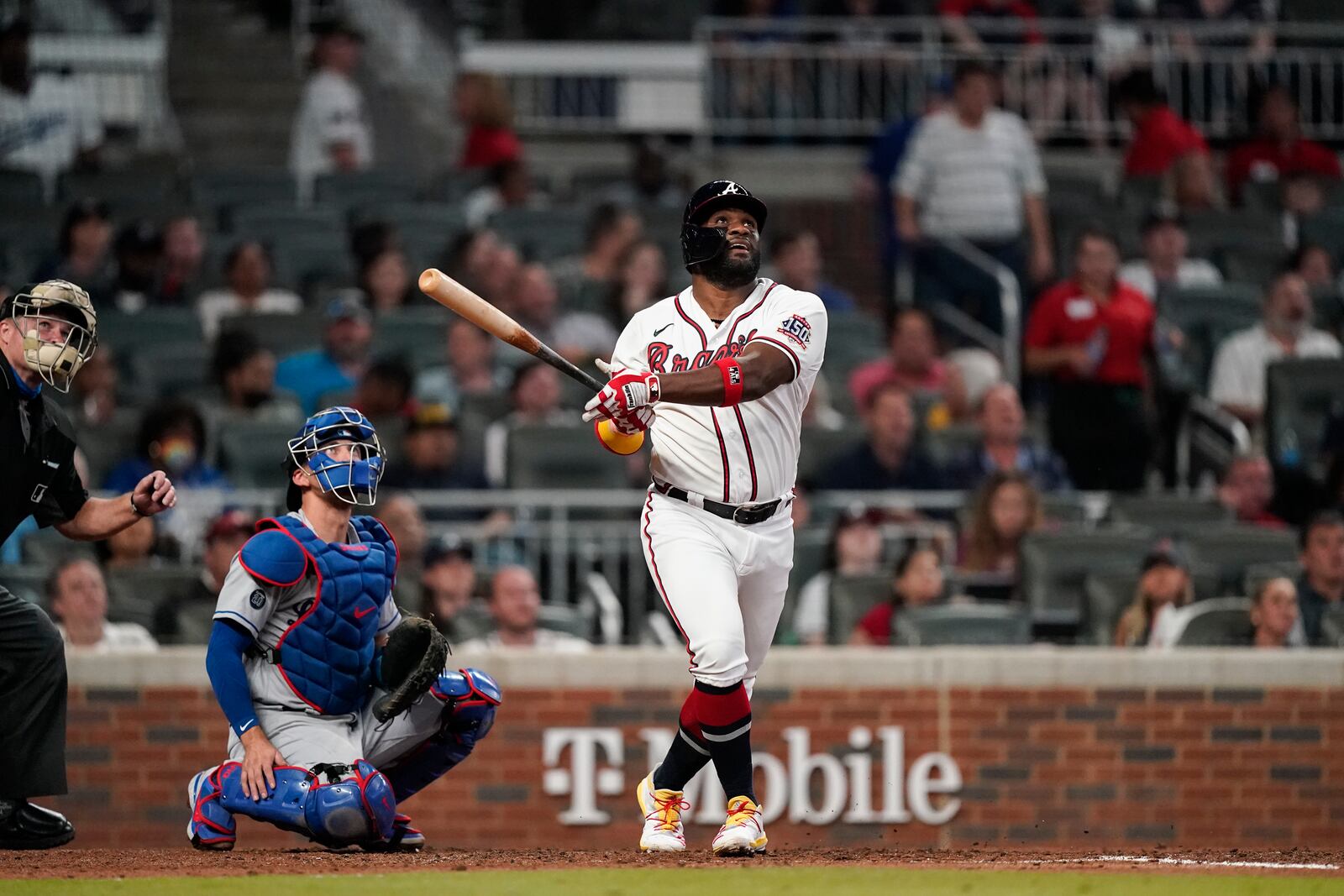 Atlanta Braves' Abraham Almonte (34) hits a home run in the seventh inning of a baseball game against the Los Angeles Dodgers Saturday, June 5, 2021, in Atlanta. (AP Photo/Brynn Anderson)