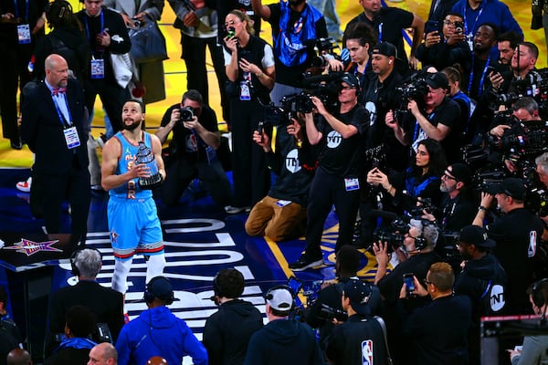 Shaq's OGs' Stephen Curry (30) poses with the MVP award after winning the NBA All-Star basketball game in San Francisco, on Sunday, Feb. 16, 2025. (Jose Carlos Fajardo/Bay Area News Group via AP)