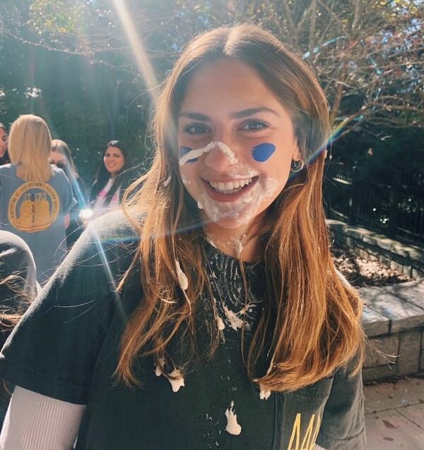 Emory University Tri Delta member Julia Tenner takes a pie in the face for a good cause and the annual Trihop fundraiser. Photo courtesy of Emory Tri Delta