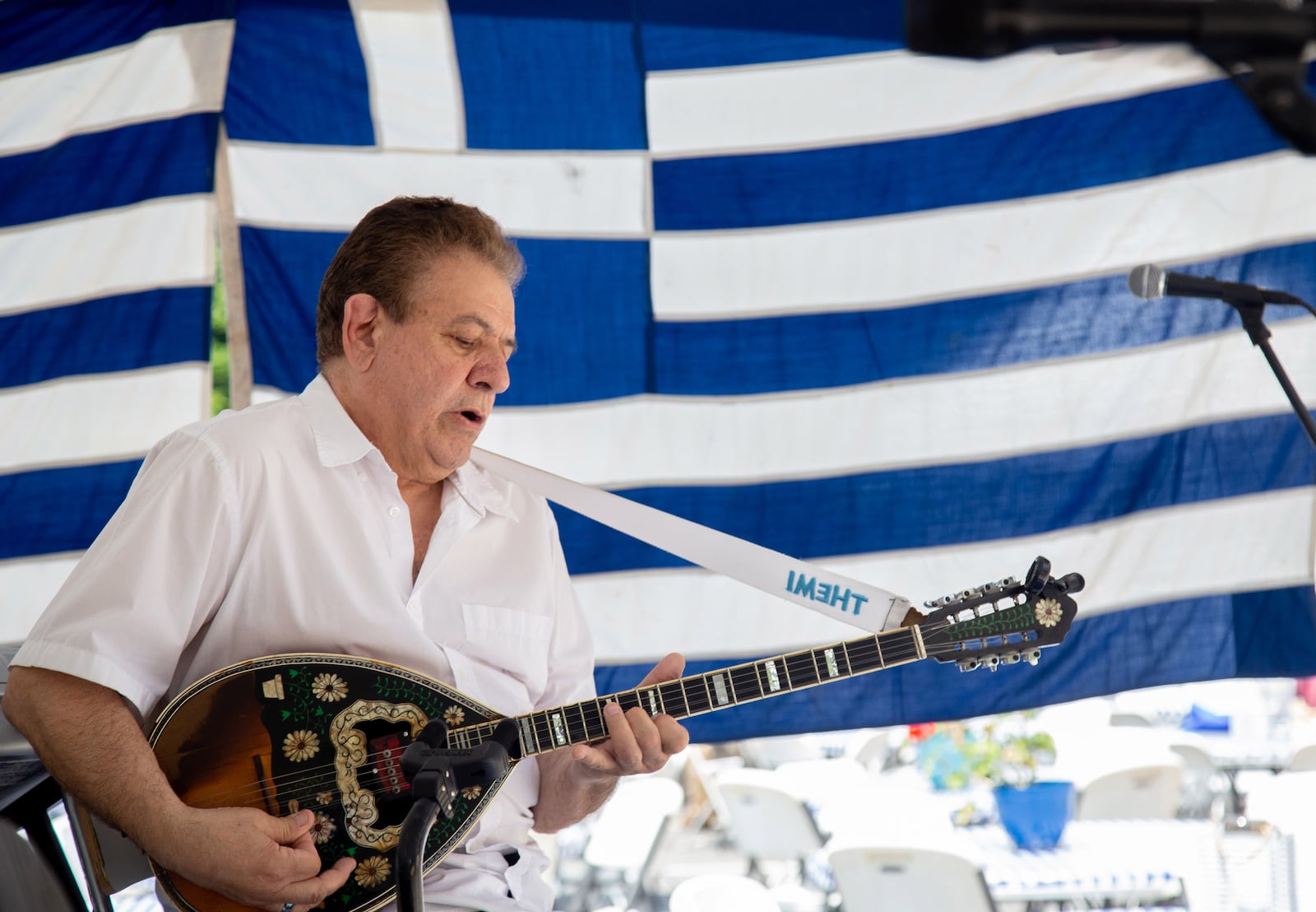 Themi Kakias plays the bouzouki with the Georga Karras band during the 29th annual Marietta Greek Festival on Saturday, May 18, 2019.  STEVE SCHAEFER / SPECIAL TO THE AJC