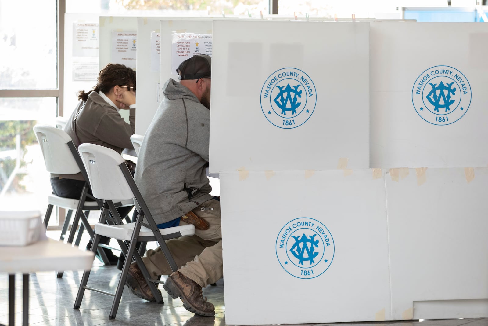 Washoe County early voting takes place at the Registrar of Voters Office in Reno, Nev., Tuesday, Oct. 29, 2024. (AP Photo/Tom R. Smedes)