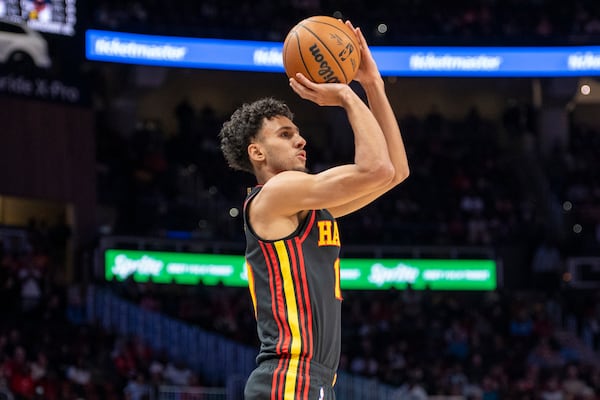 Atlanta Hawks forward Zaccharie Risacher looks to shoot during the first half of an NBA basketball game against the Detroit Pistons, Sunday, Feb. 23, 2025, in Atlanta. (AP Photo/Erik Rank)