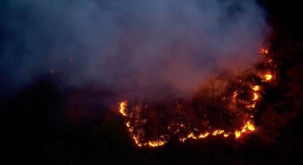 This aerial image taken from video shows a brush fire that broke out in a park on the northern tip of Manhattan in Inwood, N.Y., Wednesday, Nov. 13, 2024. (WABC-TV via AP)