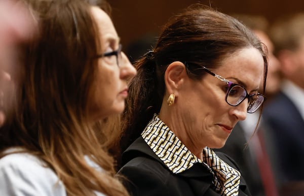 (left to right) Cobb County commissioner Keli Gambrill and plaintiff Catherine Floam sit in on a hearing before the Georgia Supreme Court about Cobb County passing its own district map at the Nathan Deal Judicial Center on Wednesday, April 17, 2024. (Natrice Miller/ AJC)