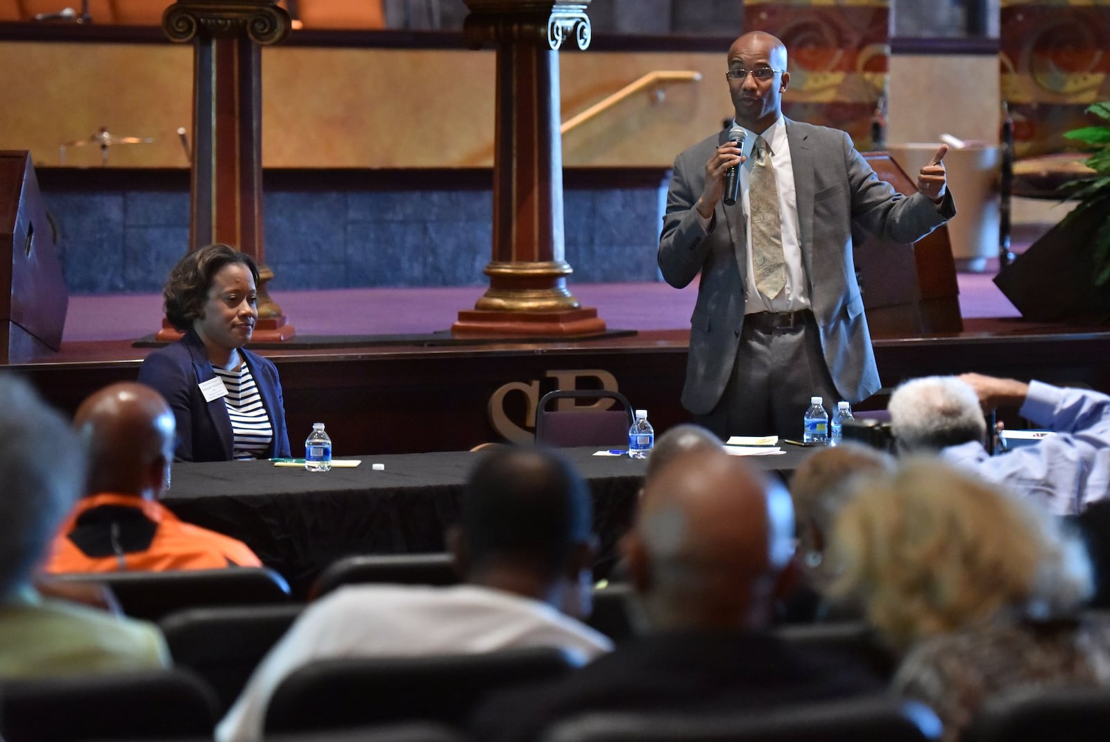 Sherry Boston and then-District-Attorney Robert James as they participated in a DeKalb County candidates forum on May 5, 2016, in Lithonia. Boston defeated James a few weeks later to become the new district attorney. HYOSUB SHIN / HSHIN@AJC.COM