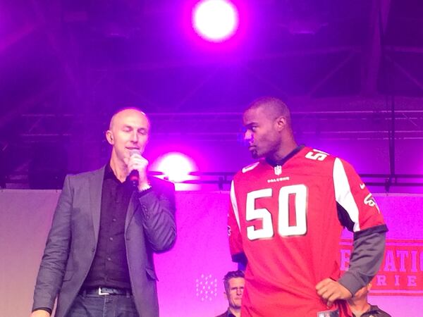 Osi Umenyiora being interviewed at the Fan Fest in London. (By D. Orlando Ledbetter/dledbetter@ajc.com)