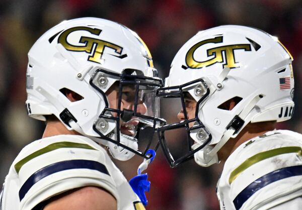 Georgia Tech quarterback Haynes King (right) is celebrated by Georgia Tech tight end Brett Seither after scoring a touchdown during the second half of an NCAA college football game at Georgia Tech's Bobby Dodd Stadium, Saturday, November 25, 2023, in Atlanta. Georgia won 31-23 over Georgia Tech. (Hyosub Shin / Hyosub.Shin@ajc.com)