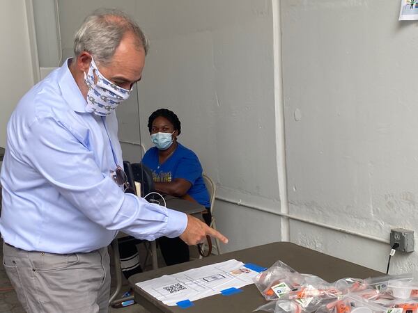 Georgia Tech President Angel Cabrera shows kits for used to test students and employees for COVID-19. ERIC STIRGUS/ERIC.STIRGUS@AJC.COM.