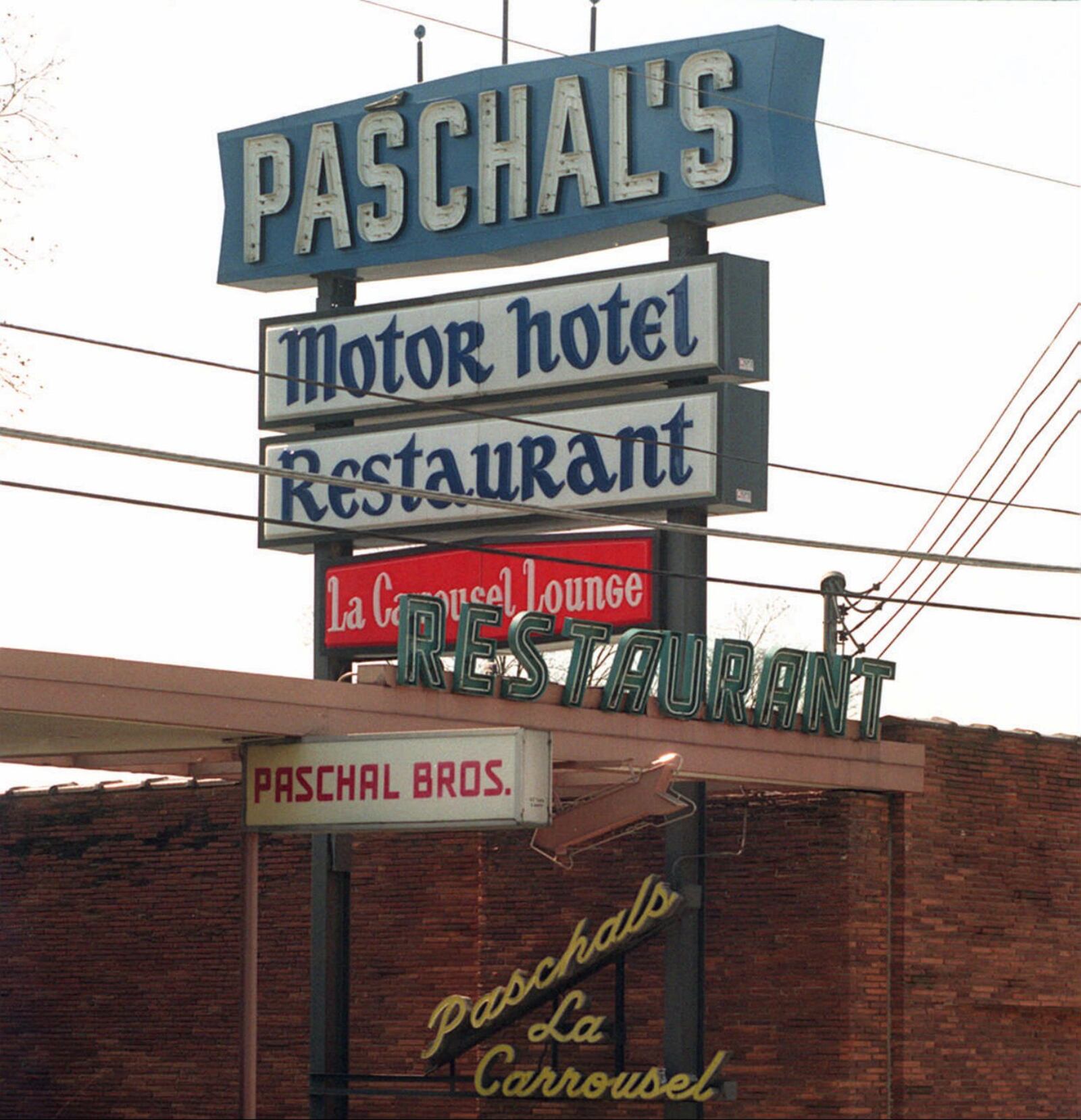 Paschal’s Motor Hotel & Restaurant has a long history in Atlanta. It was one of the Atlanta restaurants listed in "The Negro Motorist Green Book." This photo was taken when it was on MLK Jr. Drive in 1992. AJC FILE PHOTO