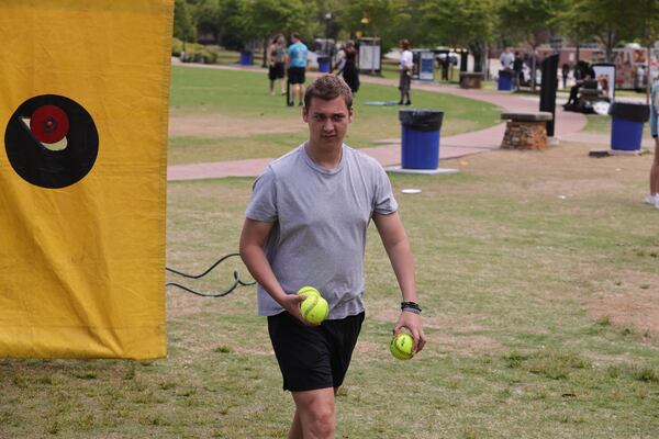 Josh DeFrank, a senior marketing major and president of Pi Kappa Phi at KSU, participates in the "Dunk-a-Brother" event Wednesday.