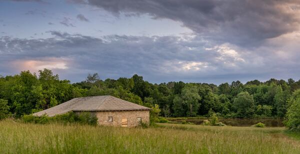 A landscape of the historic dairy barn at sunrise on the property of the former United Methodist Children's Home in Decatur. This photo will be on display at the upcoming DeKalb History Center exhibit. Courtesy of Beate Sass