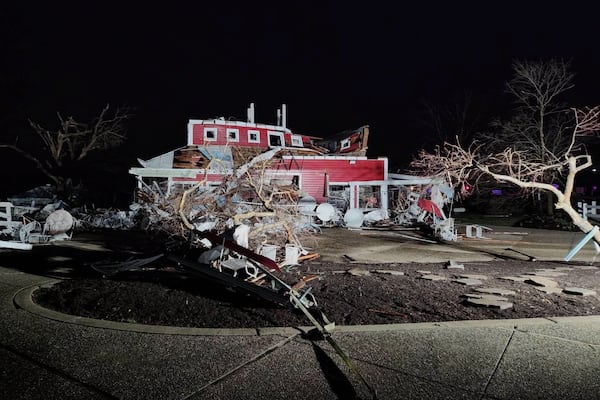 In this photo provided by Missouri State Highway Patrol, a home is damaged after a severe storm passed the area near Ozark County, Mo., late Friday, March 14, 2025. (Missouri State Highway Patrol via AP)