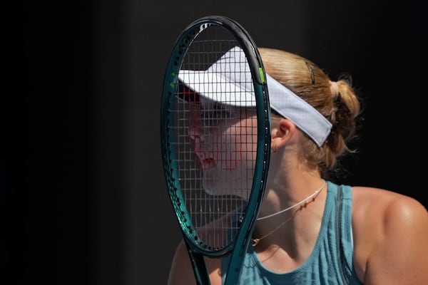 Mirra Andreeva of Russia reacts during a fourth round match against Aryna Sabalenka of Belarus at the Australian Open tennis championship in Melbourne, Australia, Sunday, Jan. 19, 2025. (AP Photo/Mark Baker)