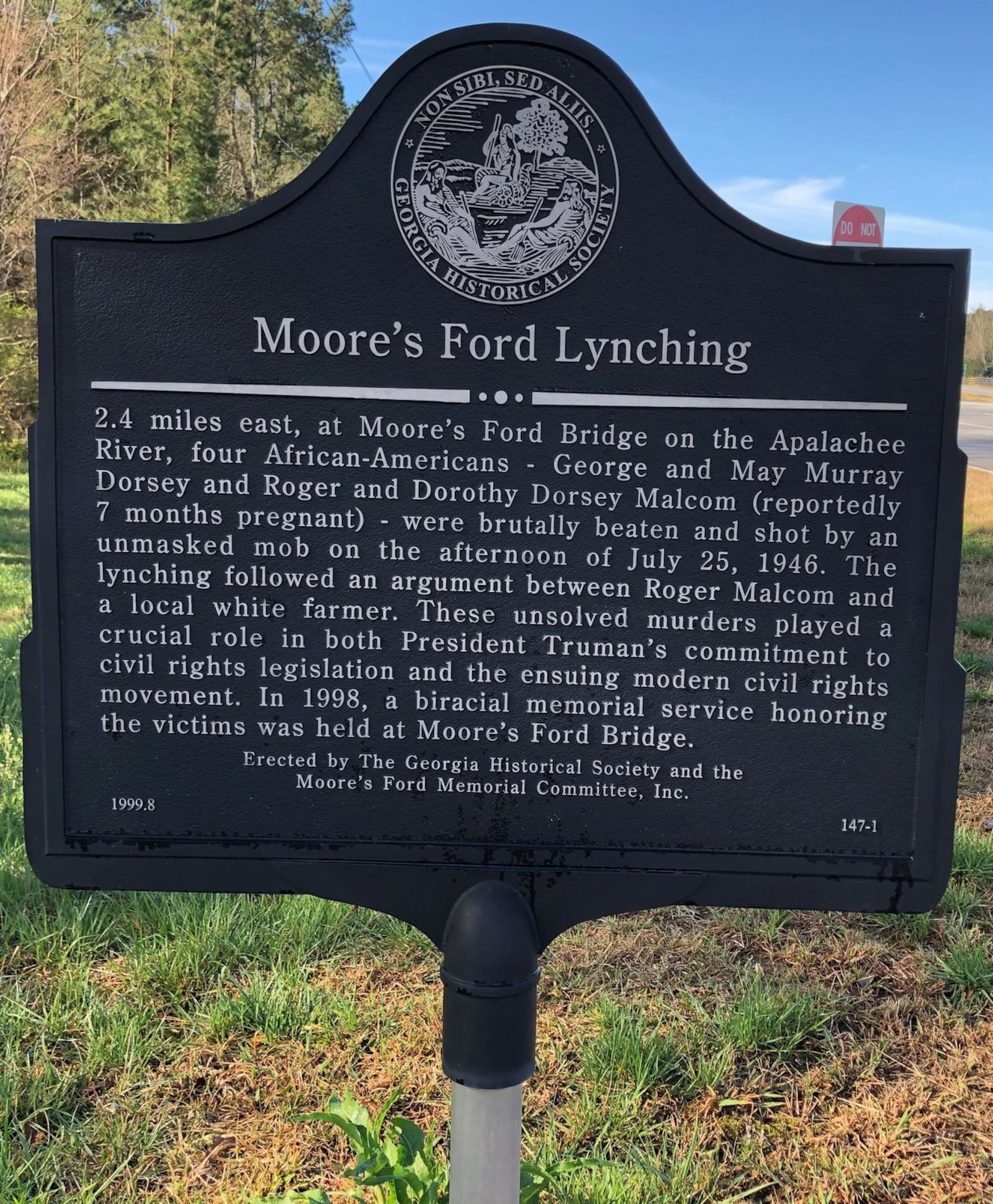 This historic marker at Highway 79 and Locklin Road commemorates the lynching of George and Mae Dorsey and Roger and Dorothy Malcom in 1946. It was erected by the Georgia Historical Society and the Moore’s Ford Memorial Committee. GRACIE BONDS STAPLES / GSTAPLES@AJC.COM