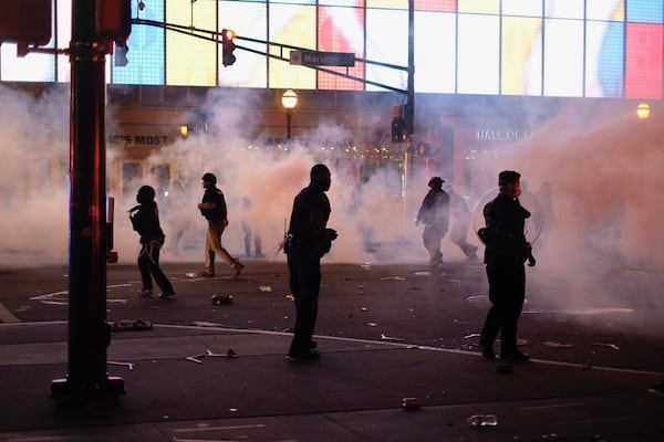 Protesters damaged the College Football Hall of Fame in Atlanta.