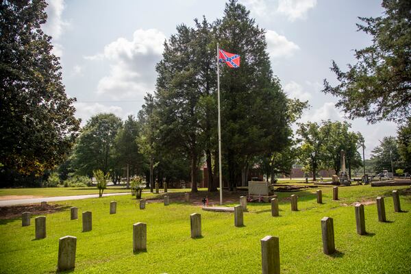 07/26/2021 — Newnan, Georgia —A Confederate flag is displayed at a Confederate States Army graveyard at the Oak Hill Cemetery in Newnan, Monday, July 26, 2021. (Alyssa Pointer/Atlanta Journal- Constitution)