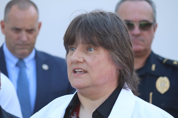 Gwinnett County Medical Examiner Carol Terry during a Friday press conference warns of the dangers of fentanyl-laced street drugs. Her office has encountered an uptick in fentanyl-related deaths in recent years. (Tyler Wilkins / tyler.wilkins@ajc.com)