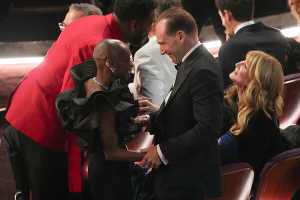 Colman Domingo, from left, Cynthia Erivo, Ralph Fiennes, and Laura Dern in the audience during the Oscars on Sunday, March 2, 2025, at the Dolby Theatre in Los Angeles. (AP Photo/Chris Pizzello)