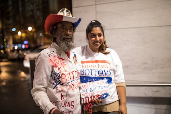 Charles Doyle, left, and Sarah Pirzad pose for photo before an election night party for Atlanta mayoral candidate Keisha Lance Bottoms, who is running against mayoral candidate Mary Norwood, at the Hyatt Regency Hotel, Tuesday, Dec. 5, 2017, in Atlanta.  BRANDEN CAMP/SPECIAL