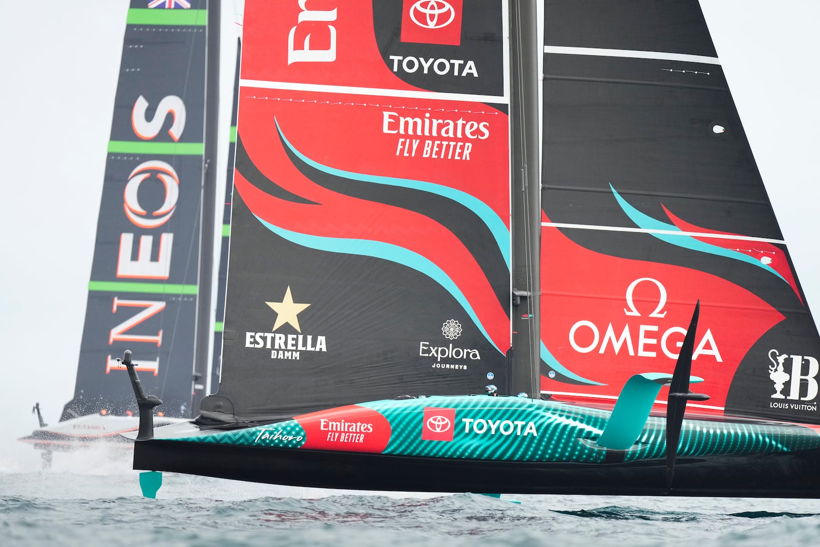 Ineos Britannia and Emirates Team New Zealand race during the Louis Vuitton 37th America's Cup race in Barcelona, Spain, Saturday, Oct. 12, 2024. (AP Photo/Bernat Armangue)