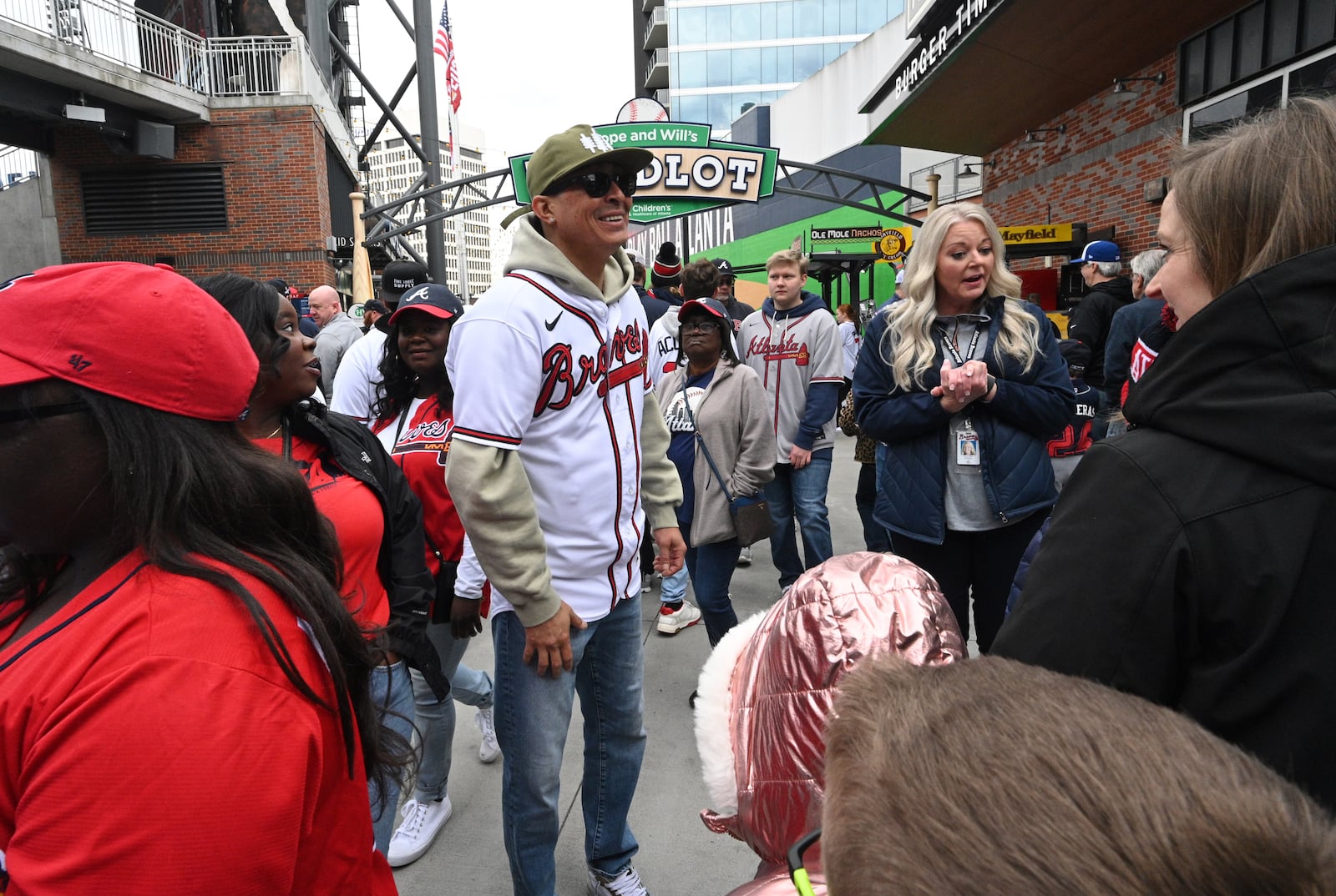 Atlanta Braves’  pitcher Jesse Chavez is greeted by fans during 2023 Braves Fan Fest at  the Truist Park, Saturday, Jan. 21, 2023, in Atlanta. After not holding the event for several years due to the pandemic, the team will bring back the fan event Saturday. Fan Fest will be held at Truist Park and The Battery from 10 a.m. to 4 p.m. The free event will feature player autographs and photos, Q&A sessions, clinics, games, on-field activities, live entertainment and panel discussions with players and coaches. (Hyosub Shin / Hyosub.Shin@ajc.com)