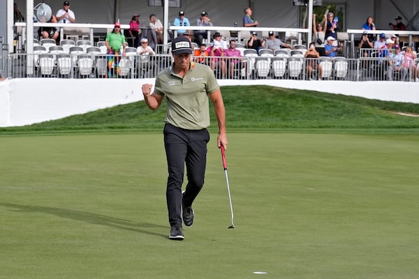 Viktor Hovland, of Norway, reacts to his his birdie putt on the 17th hole during the final round of the Valspar Championship golf tournament Sunday, March 23, 2025, at Innisbrook in Palm Harbor, Fla. (AP Photo/Chris O'Meara)