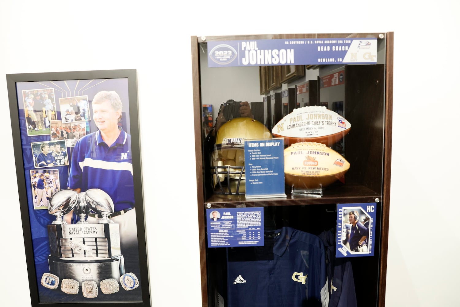 Artifacts from former Georgia Tech coach Paul Johnson are on display as as part of the 2023 class at the College Football Hall of Fame on Thursday, Sept. 28, 2023, in Atlanta. 
Miguel Martinez /miguel.martinezjimenez@ajc.com