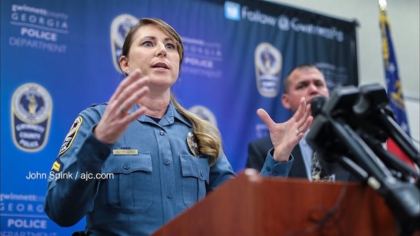 Gwinnett County police Cpl. Michele Pihera (left) and Athens-Clarke County police Capt. Jerry Saulters address the media during a news conference Tuesday. JOHN SPINK / JSPINK@AJC.COM