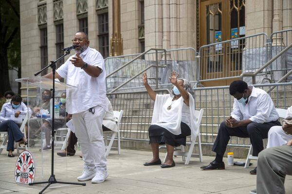 A man offers prayers for the family and friends of Secoriea Turner during a prayer vigil put together by Elisabeth Williams-Omilami and Afemo Omilami of Hosea Helps at Atlanta’s City Hall on Wednesday, July 8, 2020. (ALYSSA POINTER / ALYSSA.POINTER@AJC.COM)