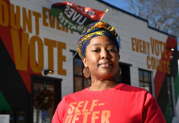 January 28, 2021 Atlanta - Kiyomi Rollins, co-founder of The Ke'nekt Cooperative, poses outside The Ke'nekt Cooperative in Southwest Atlanta on Thursday, January 28, 2021. Rollins voted for Mayor Bottoms last time, but she isn't exactly please with how the mayor has handled the city.(Hyosub Shin / Hyosub.Shin@ajc.com)