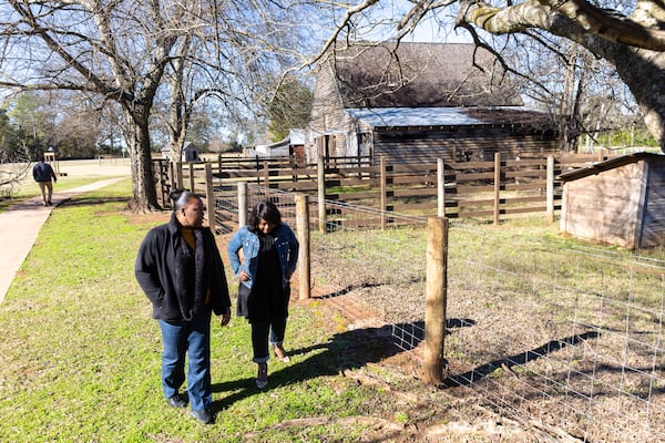 Tiffani Lowden and Carlette Wesley-Gainous tour Jimmy Carter’s boyhood farm in Plains on Monday. (Arvin Temkar / AJC)