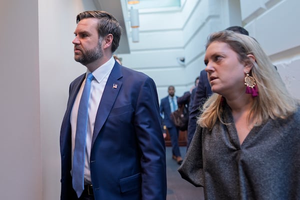 Vice President JD Vance arrives for a closed-door meeting as House Republicans push ahead with a with a go-it-alone strategy on an interim GOP spending bill that would keep federal agencies funded through Sept. 30 despite key Republican holdouts and united opposition from Democrats, at the Capitol, in Washington, Tuesday, March 11, 2025. (AP Photo/J. Scott Applewhite)