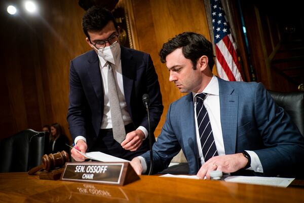 Sen. Jon Ossoff (D-Ga.) prepares for a Senate Permanent Subcommittee on Investigations hearing on Capitol Hill in Washington, July 26, 2022. The committee heard testimony from whistle blowers, including top officials at the prison, on conditions at the U.S. Penitentiary Atlanta. (Pete Marovich/The New York Times)