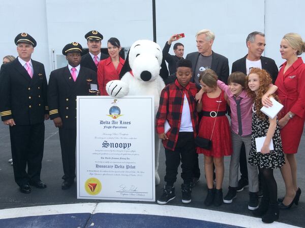 "The Peanuts" cast members including, Marleik "Mar Mar" Walker, from Snoopy's left, Hadley Belle Miller, Noah Schnapp and Francesca Capaldi