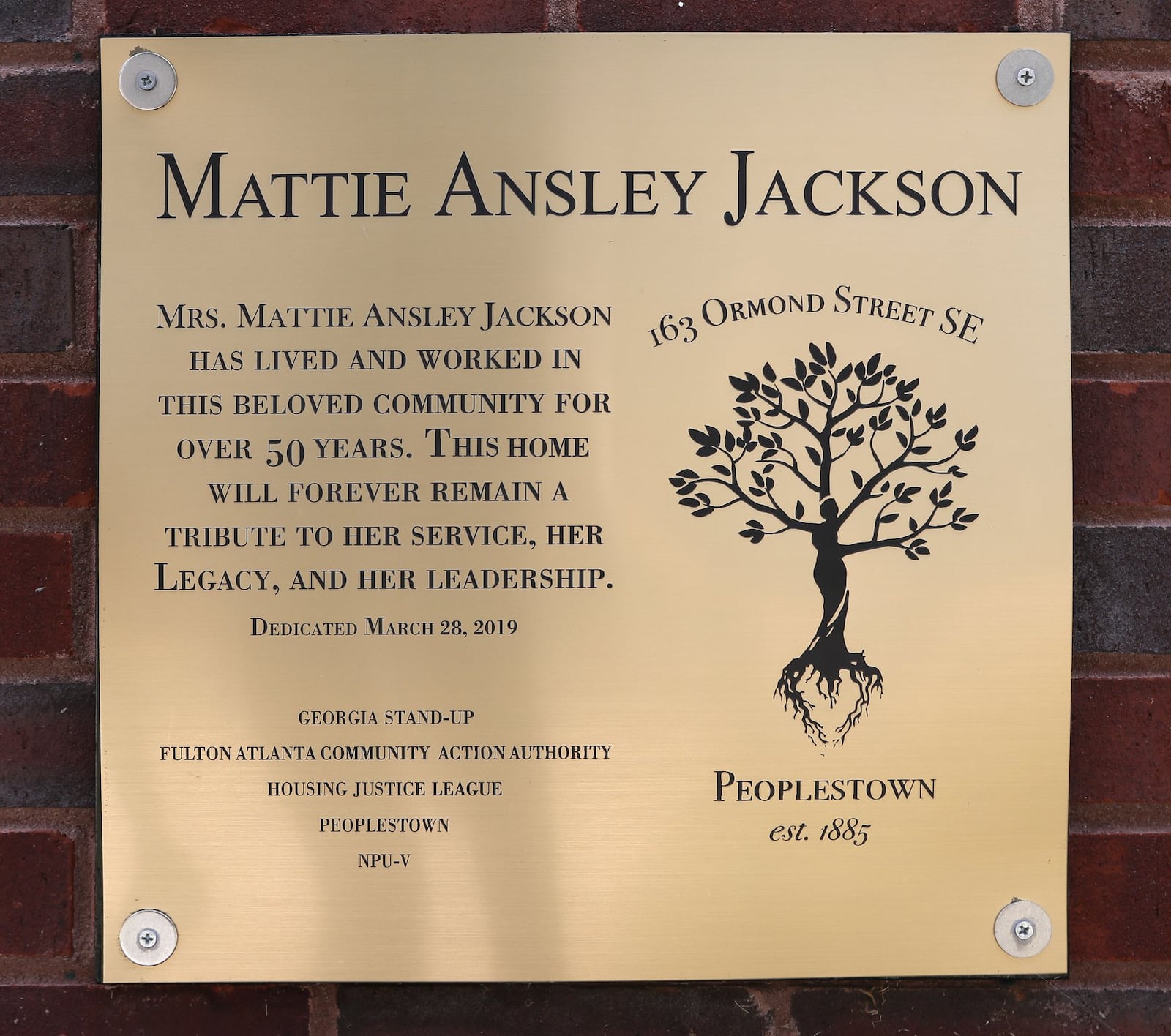 Neighbors paid for this plaque on Mattie Ansley Jackson’s house.  Bob Andres / robert.andres@ajc.com