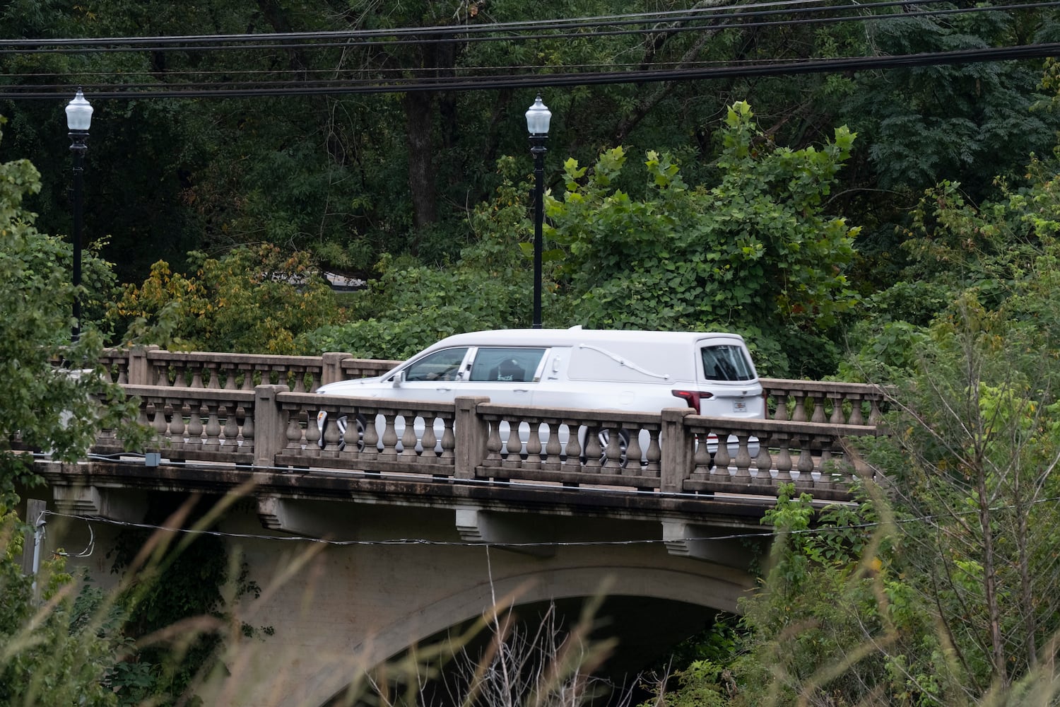 The hearse heads towards the Jefferson Civic Center for the funeral of Mason Alexander Schermerhorn on Saturday, Sept. 14, 2024.   Ben Gray for the Atlanta Journal-Constitution