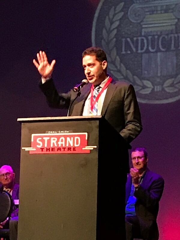  Mark Arum gives a shout out to the late Capt. Herb Emory and Emory's widow Karen in the audience. CREDIT: Rodney Ho/rho@ajc.com