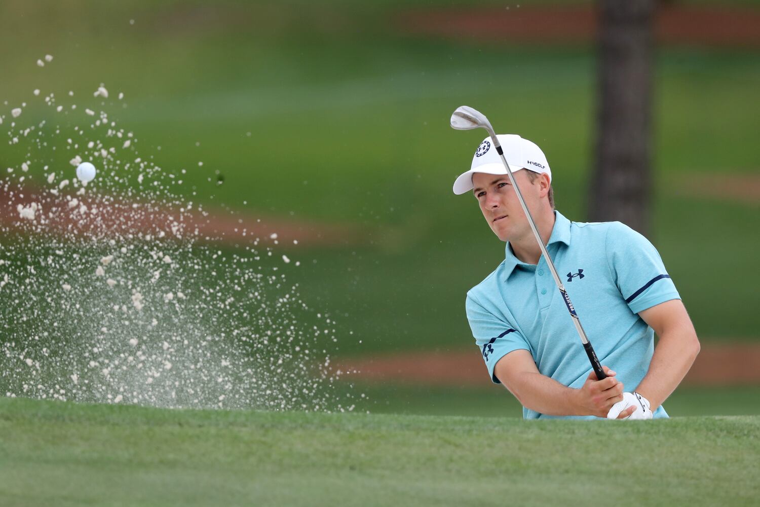 April 9, 2021, Augusta: Jordan Spieth hits out of the bunker toward the seventh green during the second round of the Masters at Augusta National Golf Club on Friday, April 9, 2021, in Augusta. Curtis Compton/ccompton@ajc.com