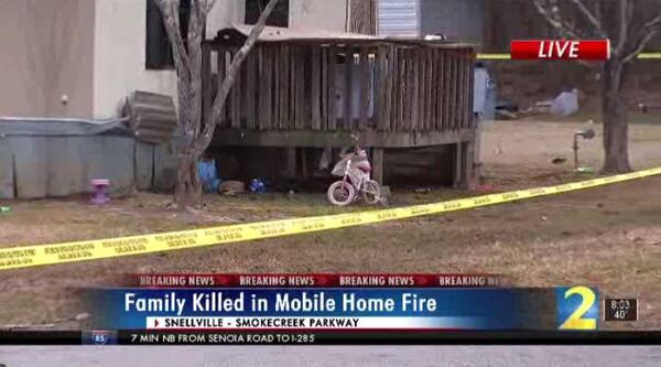 Neighbors at the scene said the family killed in Saturday's fire included a mother and her three young children.