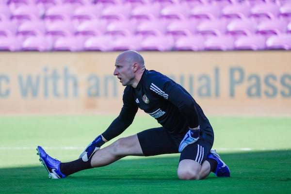 Atlanta United goalkeeper Brad Guzan (1) stretches before the MLS Eastern Conference Semifinal playoff match against Orlando City on Nov. 24 in Orlando. (Miguel Martinez/AJC)