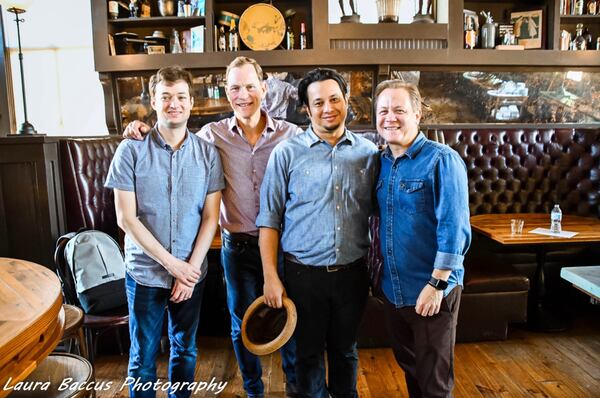 Runner-up Sean Gleason (from left), Compass Box founder John Glaser, winner Eric Simpkins and runner-up Jerry Slater.