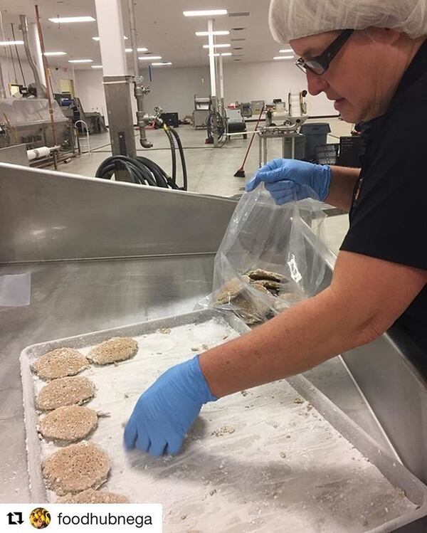 Food Bank of Northeast Georgia staff member Wanda Smith is helping the Good Life Foods, a local food company, prepare quick frozen veggie patties. Photo credit: Food Bank of Northeast Georgia