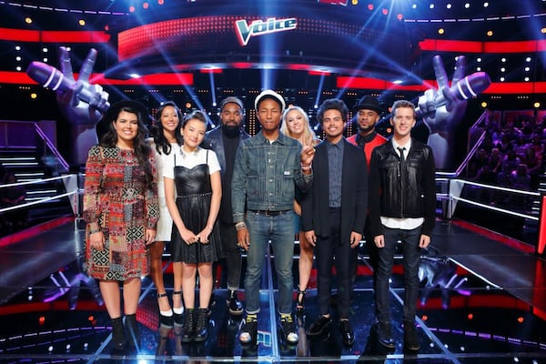 DIXSON (fourth from left) was part of team Pharrell Williams (center) from season nine of NBC's 'The Voice.'