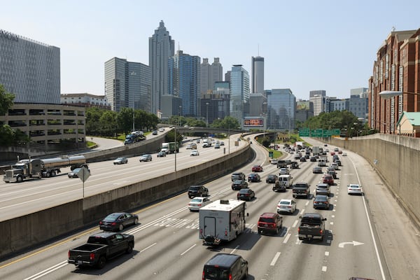 Automobiles travel south on the I-85 / I-75 connector from the view of the North Avenue bridge, Thursday, May 25, 2023, in Atlanta. (Jason Getz / Jason.Getz@ajc.com)