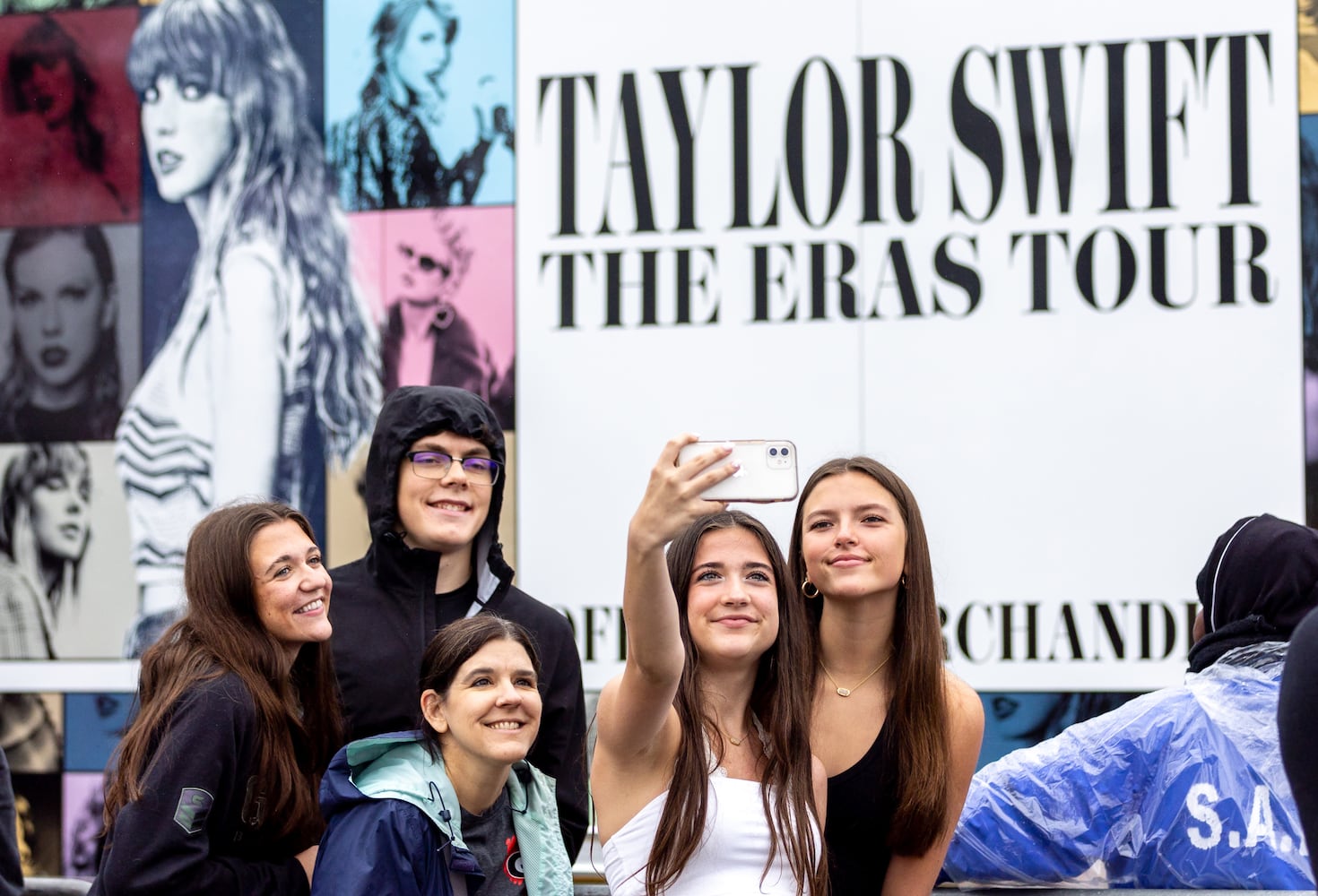 Taylor Swift Fans, Weather features, and Merchandise-selling Vendors.